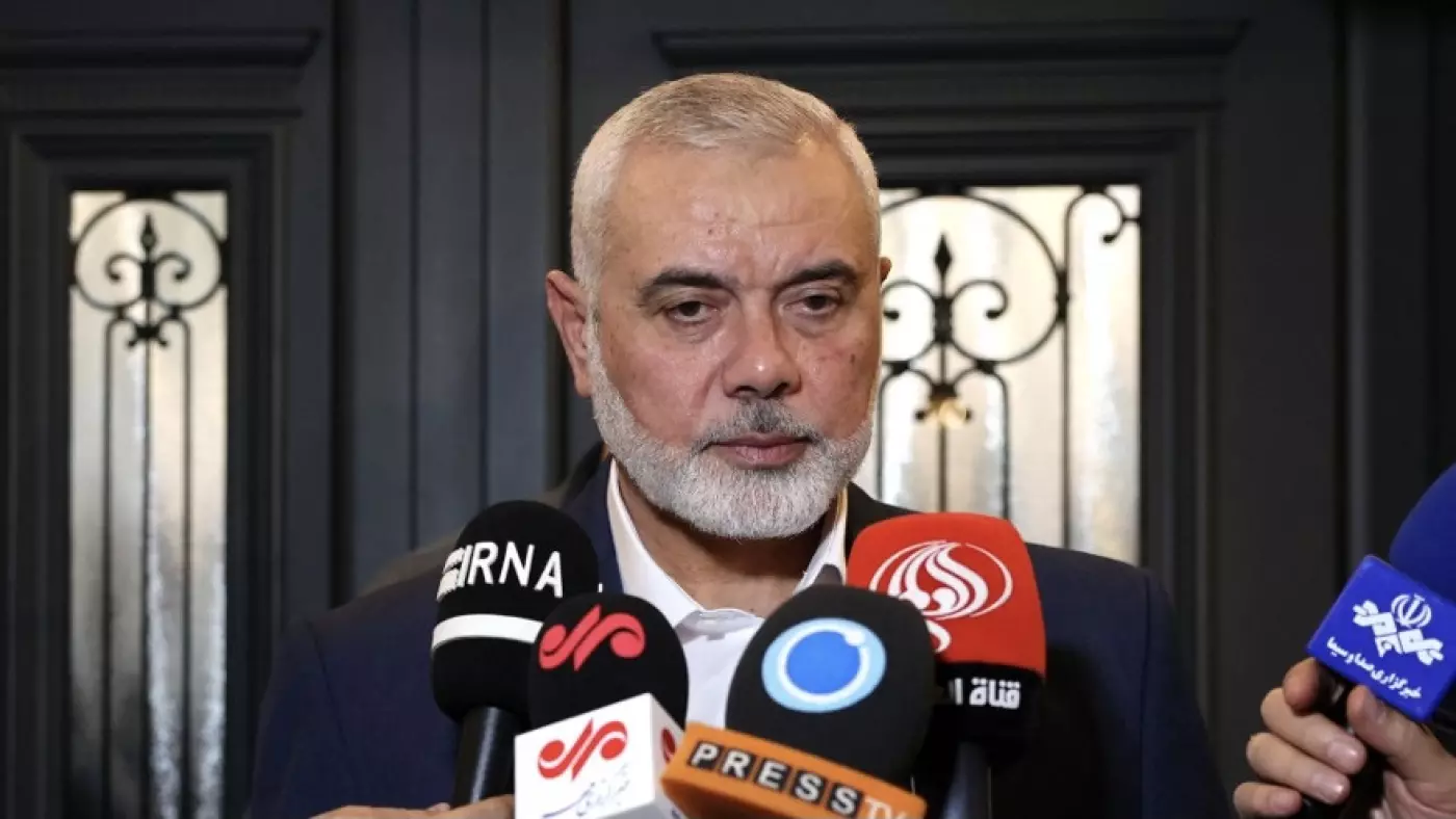 December 20 2023 shows Qatar based Hamas leader Ismail Haniyeh speaking to journalists as he welcomes the Iranian foreign minister in Doha. Iranian Foreign Ministry AFP 2.jpg