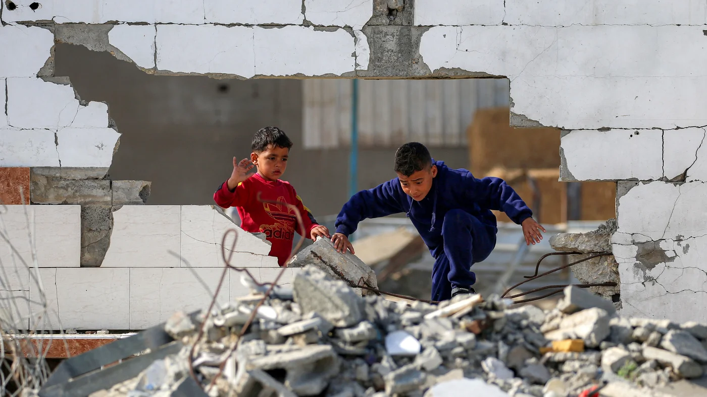 Home 2 israel attacks aftermath palestinian children inspect maghazi refugee camp cetnral gaza february 2026 afp 1 0.jpg